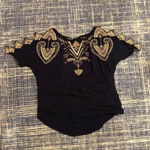 Embroidered navy blue shirt with diamond cut-outs